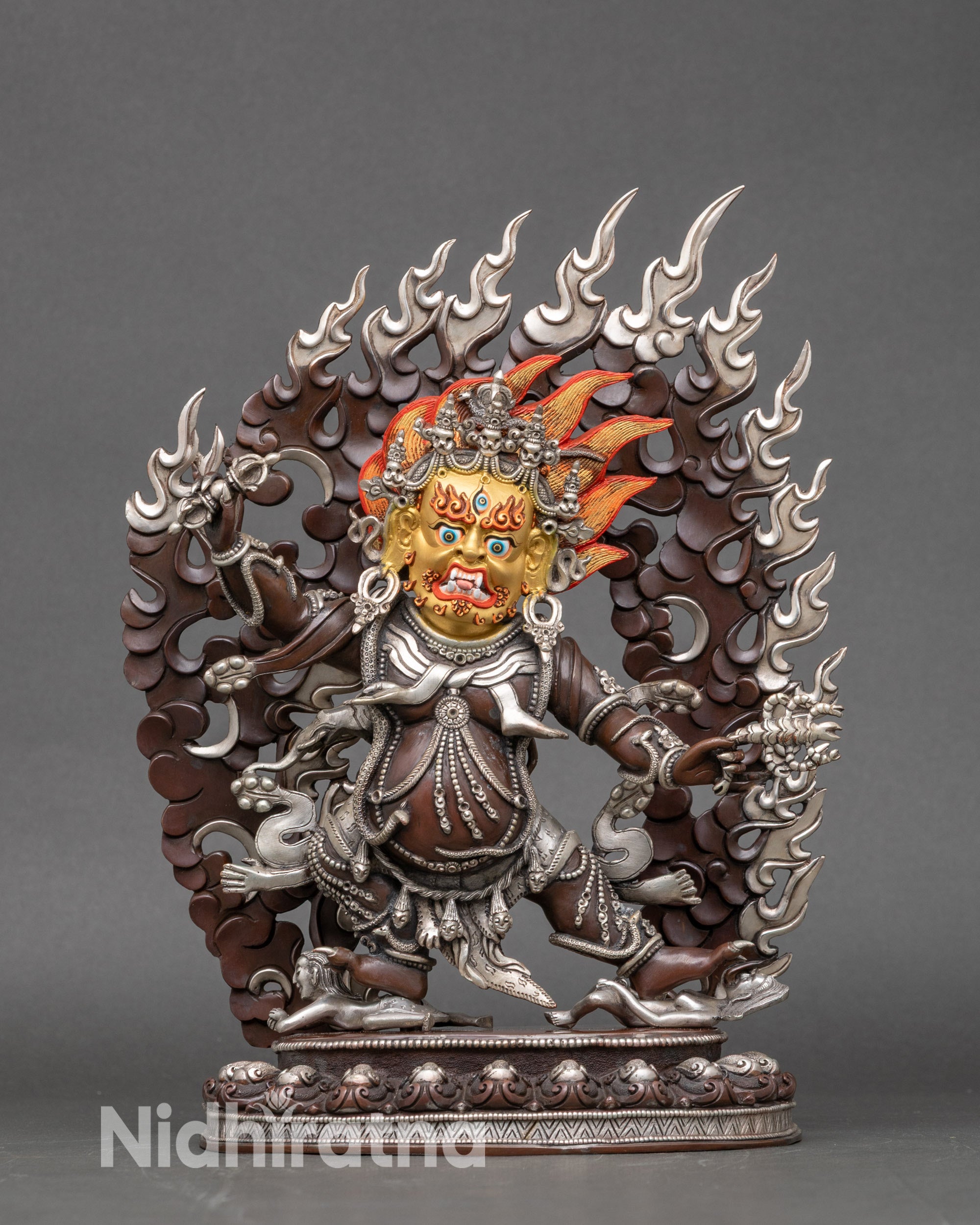 Handcrafted Guru Drakpo statue from Nepal with silver-plated finish and 24K gold face
