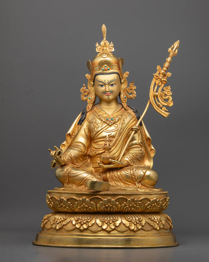 Handcrafted Guru Rinpoche Statue with 24K gold gilded copper, featuring fine details and spiritual symbolism. A sacred representation of Padmasambhava.