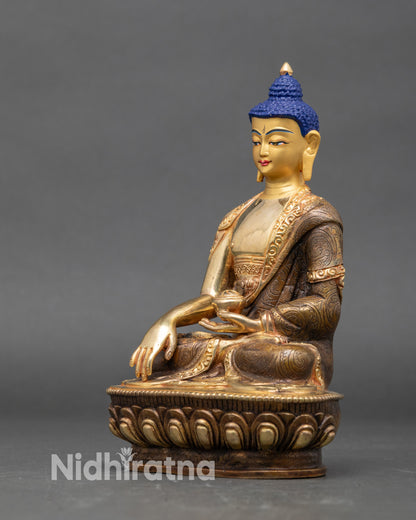 Handcrafted Himalayan Shakyamuni Buddha holding alms bowl, gold fire-gilded artwork