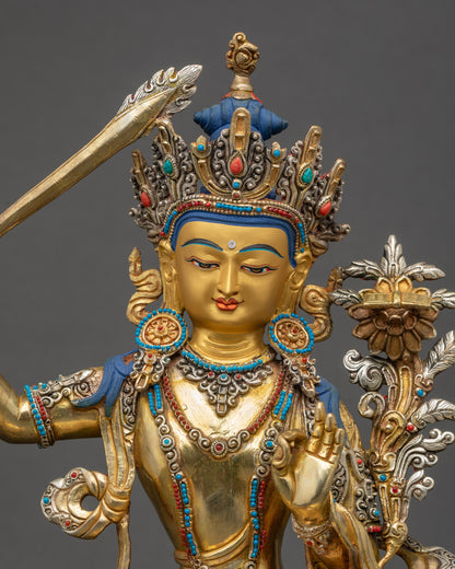 Handcrafted Manjushri Statue close up showing gold-gilded details and robes