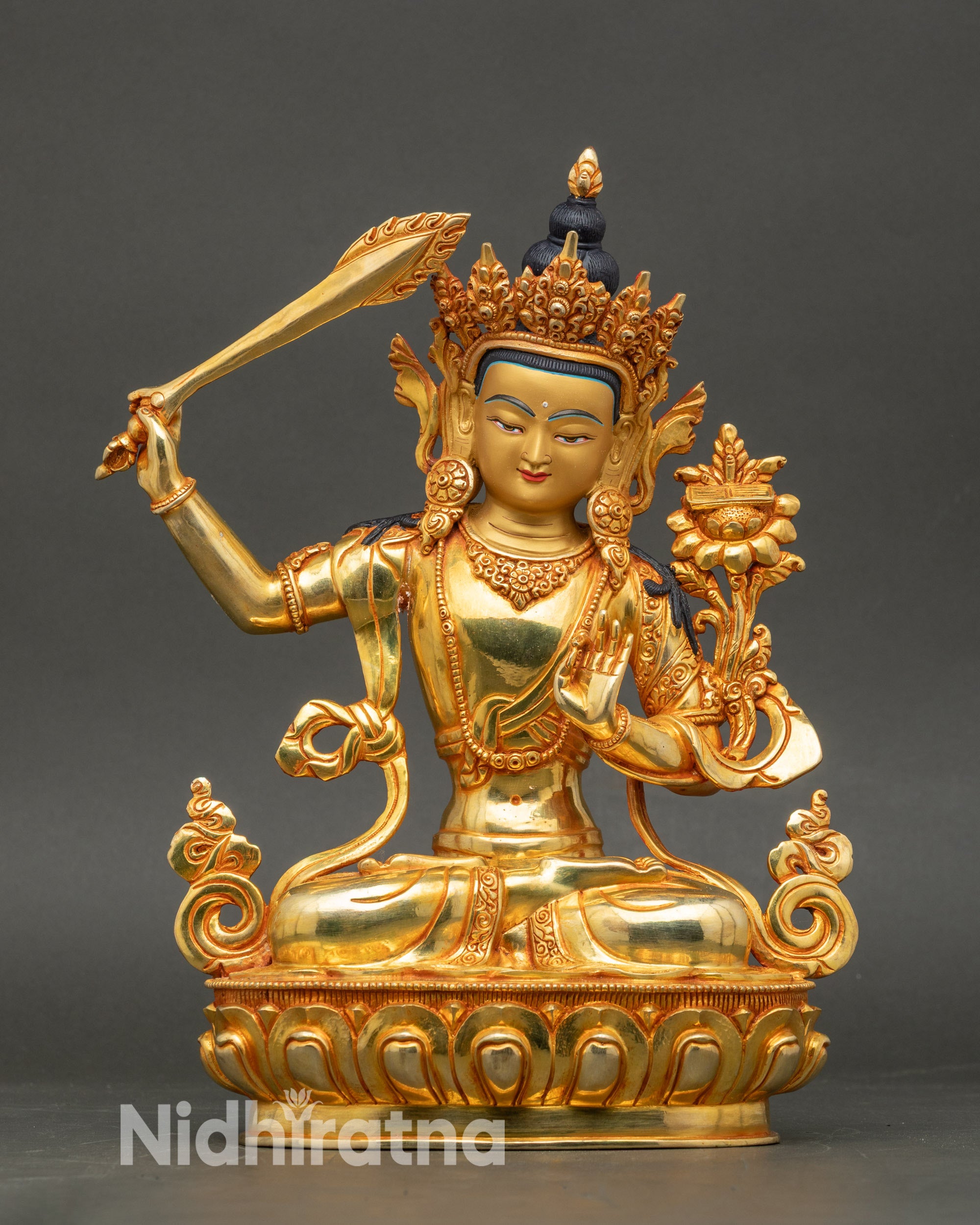 Handcrafted Manjushri Sword of Wisdom Statue from Nepal, 24K gold fire-gilded with lotus throne