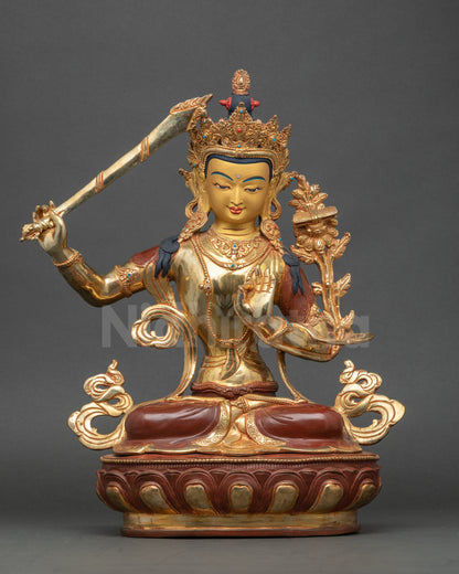 Handcrafted Nepalese Manjushri statue on lotus throne with gold fire-gilded details