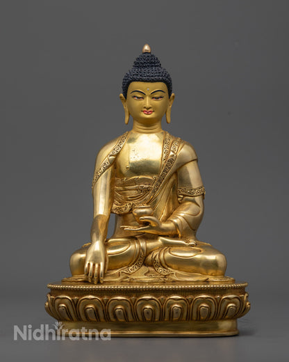 Handcrafted Shakyamuni Buddha Sculpture—Traditional lost wax method with intricate detailing, featuring a fire-gilded gold finish and a radiant 24-karat gold-coated face.