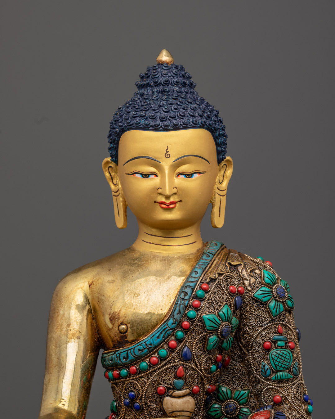 Handcrafted Shakyamuni Buddha Statue featuring intricate robe carvings, Patra bowl, and vibrant acrylic colors