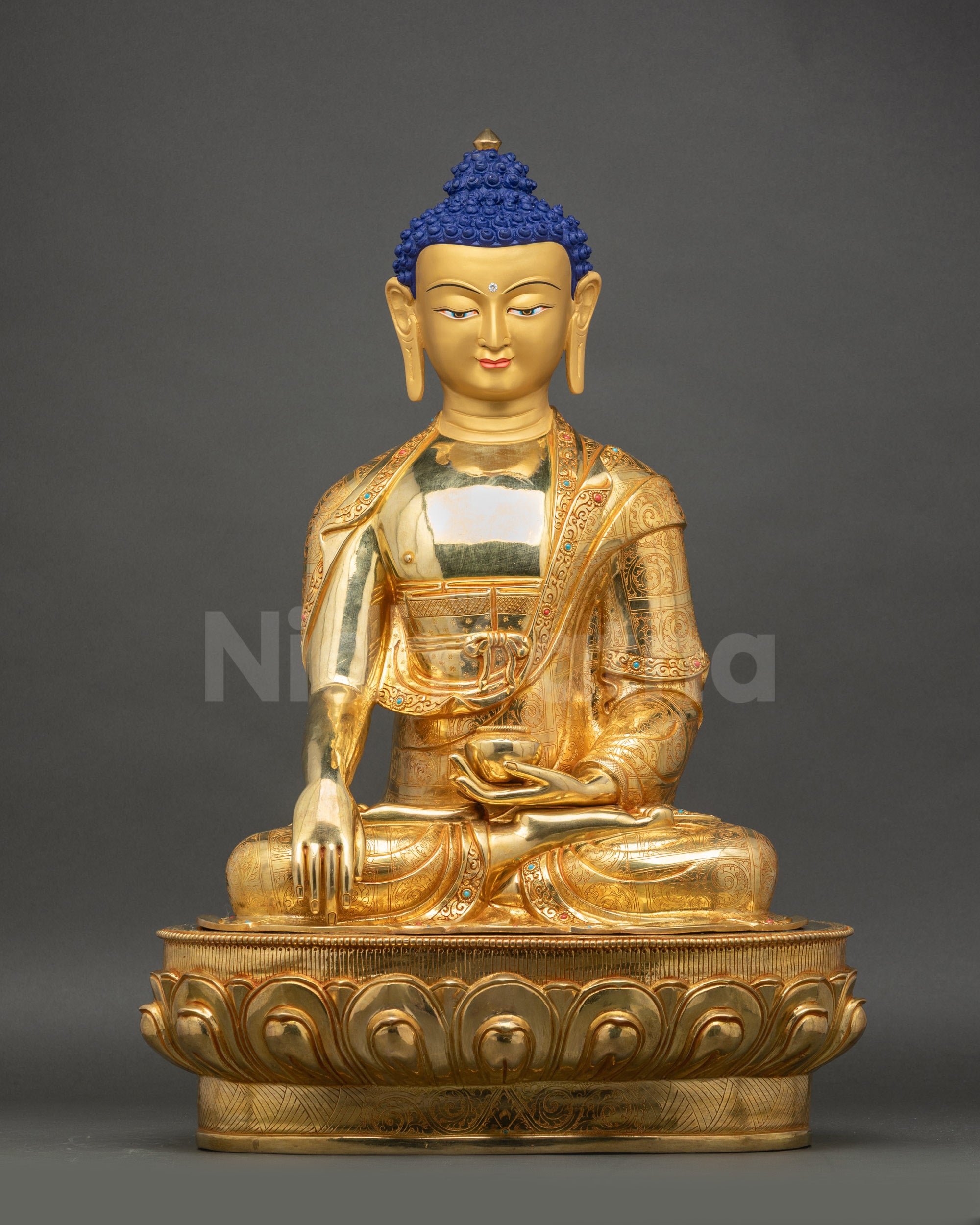 Handcrafted Shakyamuni Buddha Statue seated in lotus pose with earth-touching mudra and patra bowl
