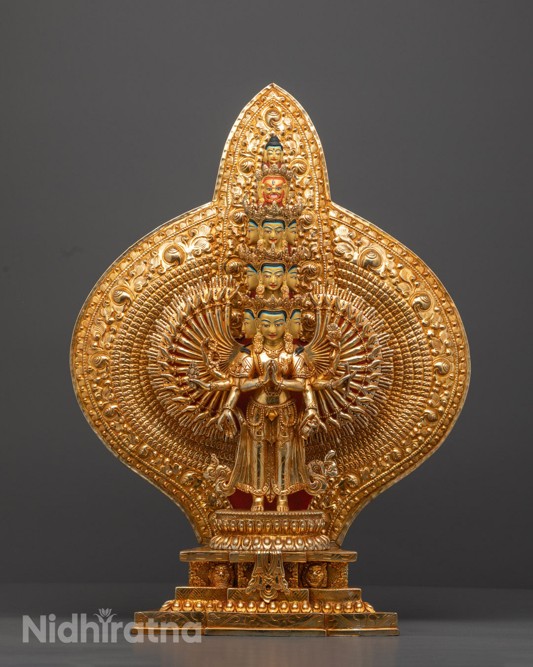Handcrafted Thousand-Armed Chenrezig Avalokiteshvara statue with intricate carvings and vibrant acrylic colors