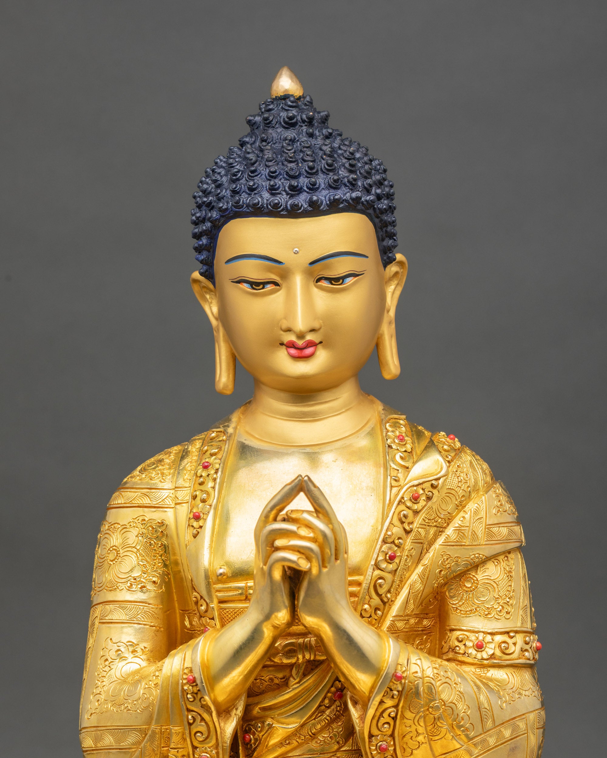 Handcrafted Vairocana Buddha sculpture with floral motif robe and teaching gesture