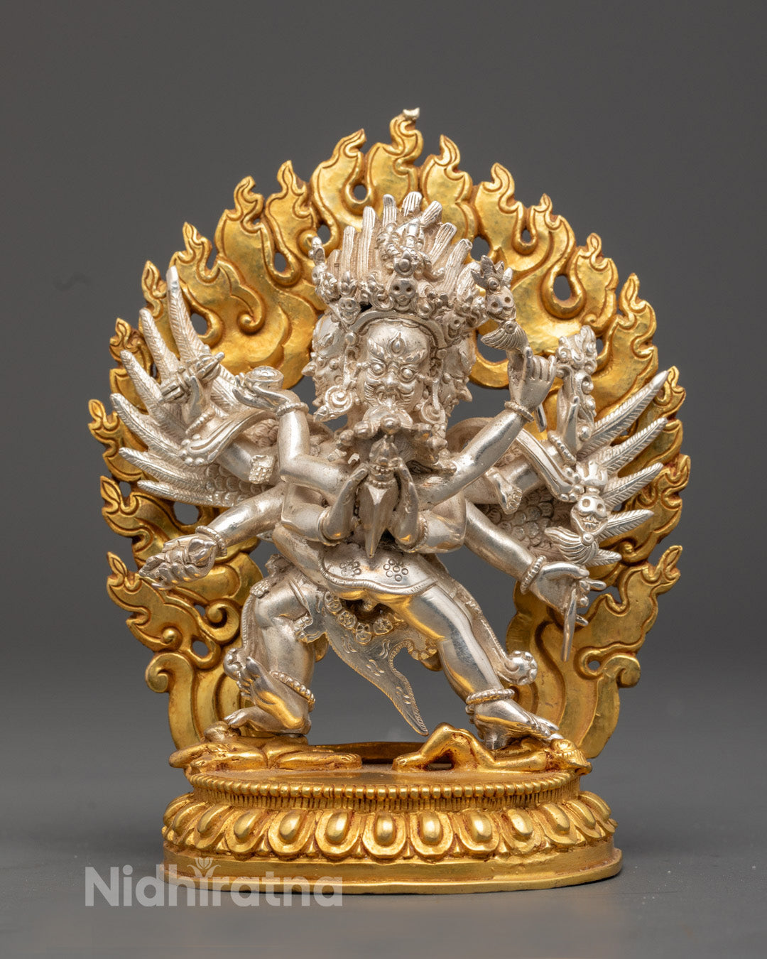 Handcrafted Vajrakilaya Statue in Silver-Plated Body with 24K Gold Fire Gilded Halo on Lotus Throne – Traditional Tibetan Buddhist sculpture made in Nepal.