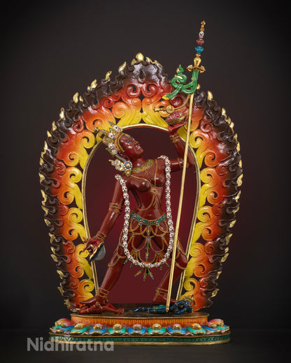 Handcrafted Vajrayogini statue made from high-quality copper, featuring a dramatic fire backdrop, vibrant acrylic colors, and an intense expression with a third eye symbolizing fierce wisdom.