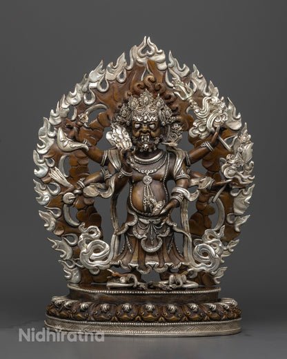 Handcrafted White Mahakala statue from Patan, Nepal, made of high-quality copper with a silver coating and vibrant acrylic colors, standing 35cm tall and 27cm wide.