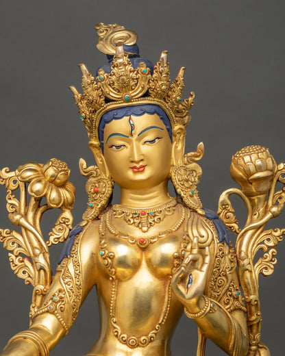 Handcrafted White Tara Statue showing seven eyes, lotus seat, and jewelry details