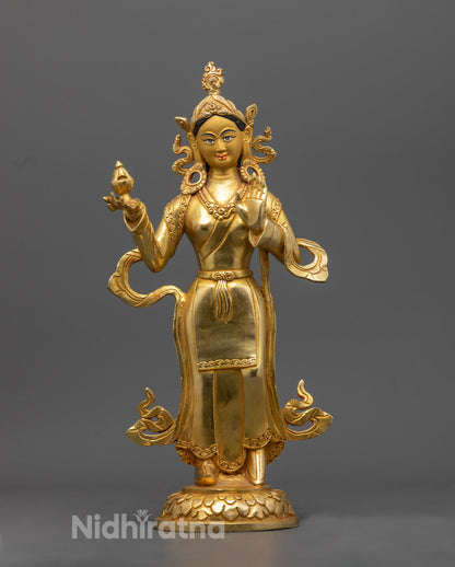Handcrafted Yeshe Tsogyal statue in traditional Tibetan attire seated on a lotus throne, symbolizing divine wisdom and spiritual awakening.