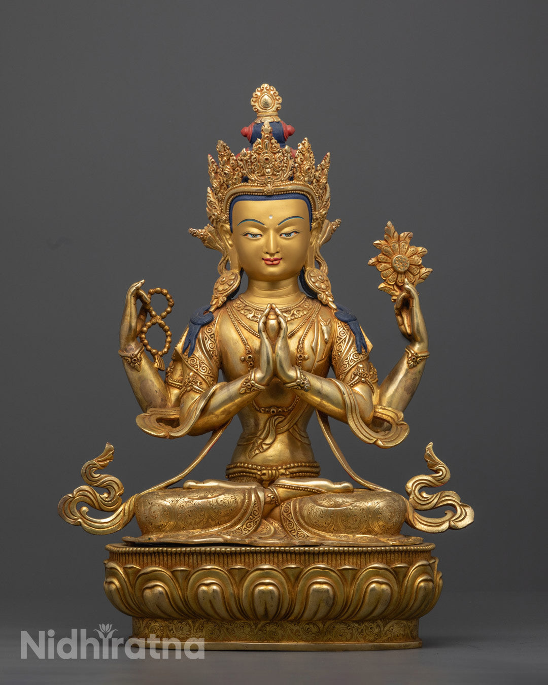Handmade Chenrezig Sculpture gold-plated Buddha statue with gold-gilded face, symbolizing compassion and spiritual growth, crafted by skilled Nepalese artisans.