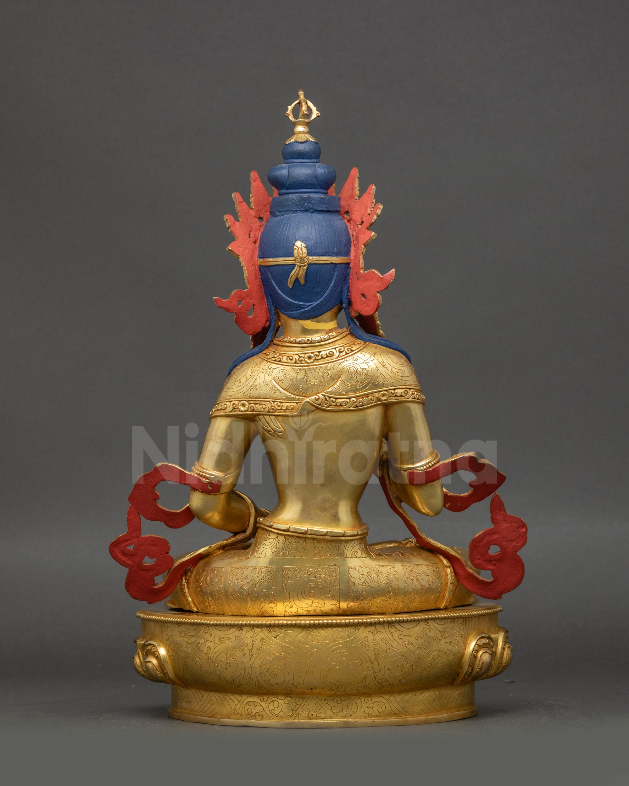 Handmade Dorje Sempa Statue back view showcasing carved lower garment and robe pattern