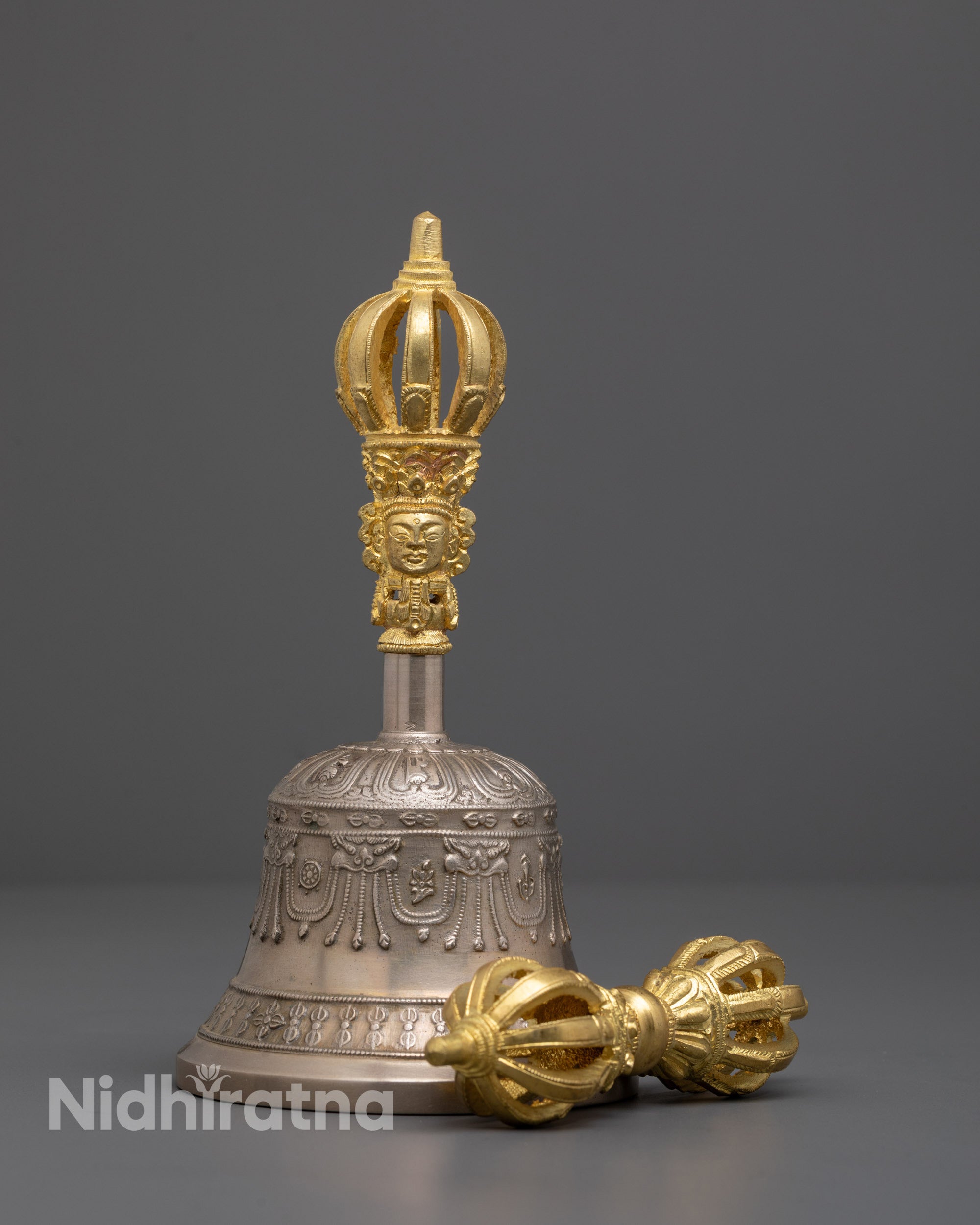 Handmade Dorje and Bell front view showing detailed gold-plated copper craftsmanship