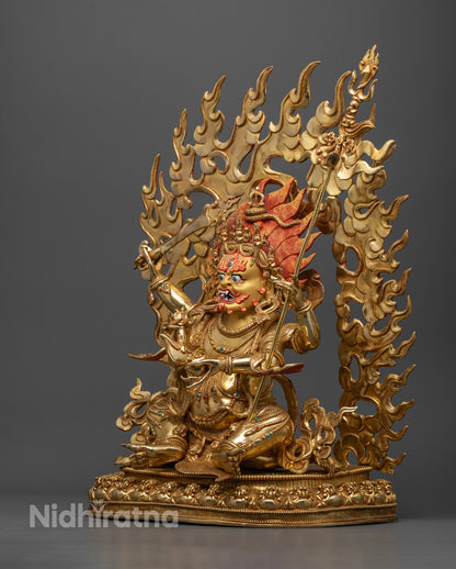 Handmade Nepalese Four-Armed Mahakala sculpture representing spiritual strength and wrathful compassion