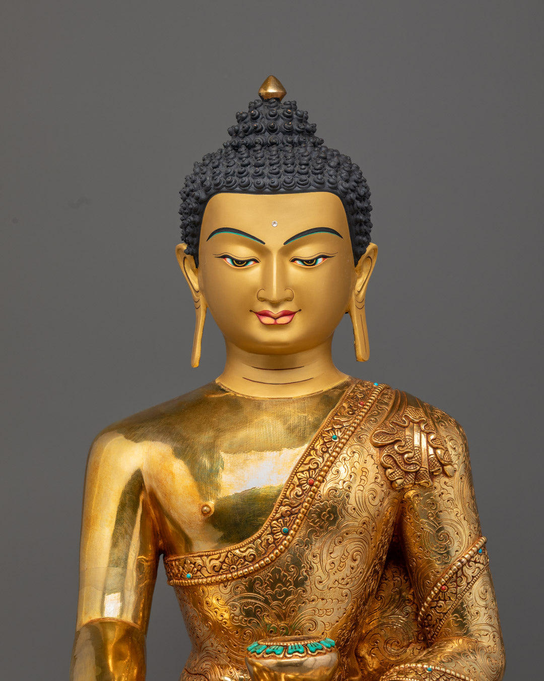 Handmade Shakyamuni Buddha statue featuring fire-gilded gold body and solid copper base with intricate detailing