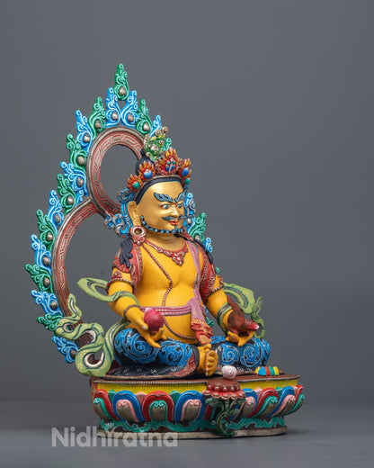 Handmade copper Dzambhala sculpture featuring intricate five-jeweled crown, ornate jewelry, flowing robe, and radiant halo