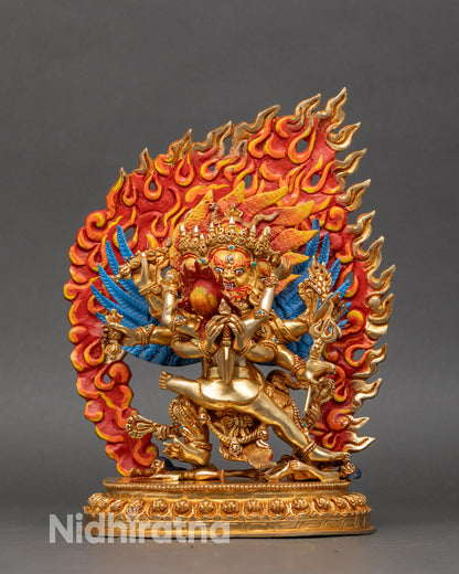 Hayagriva copper statue with red face, multiple arms, ornate crown, and lotus base