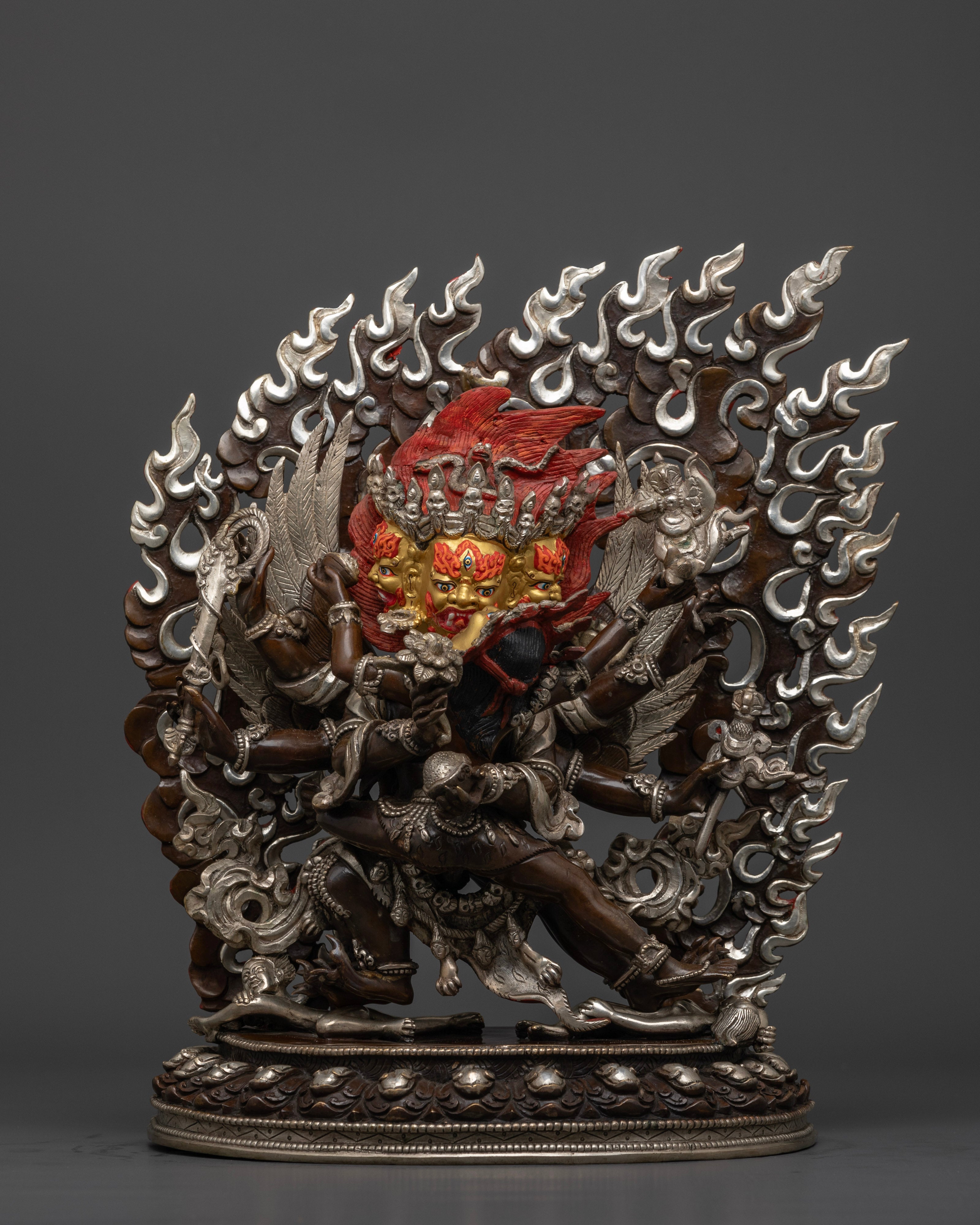 Hayagriva statue, featuring a horse’s head atop a human body, symbolizing swift eradication of ignorance, with silver plating and vibrant acrylic painting over oxidized copper.