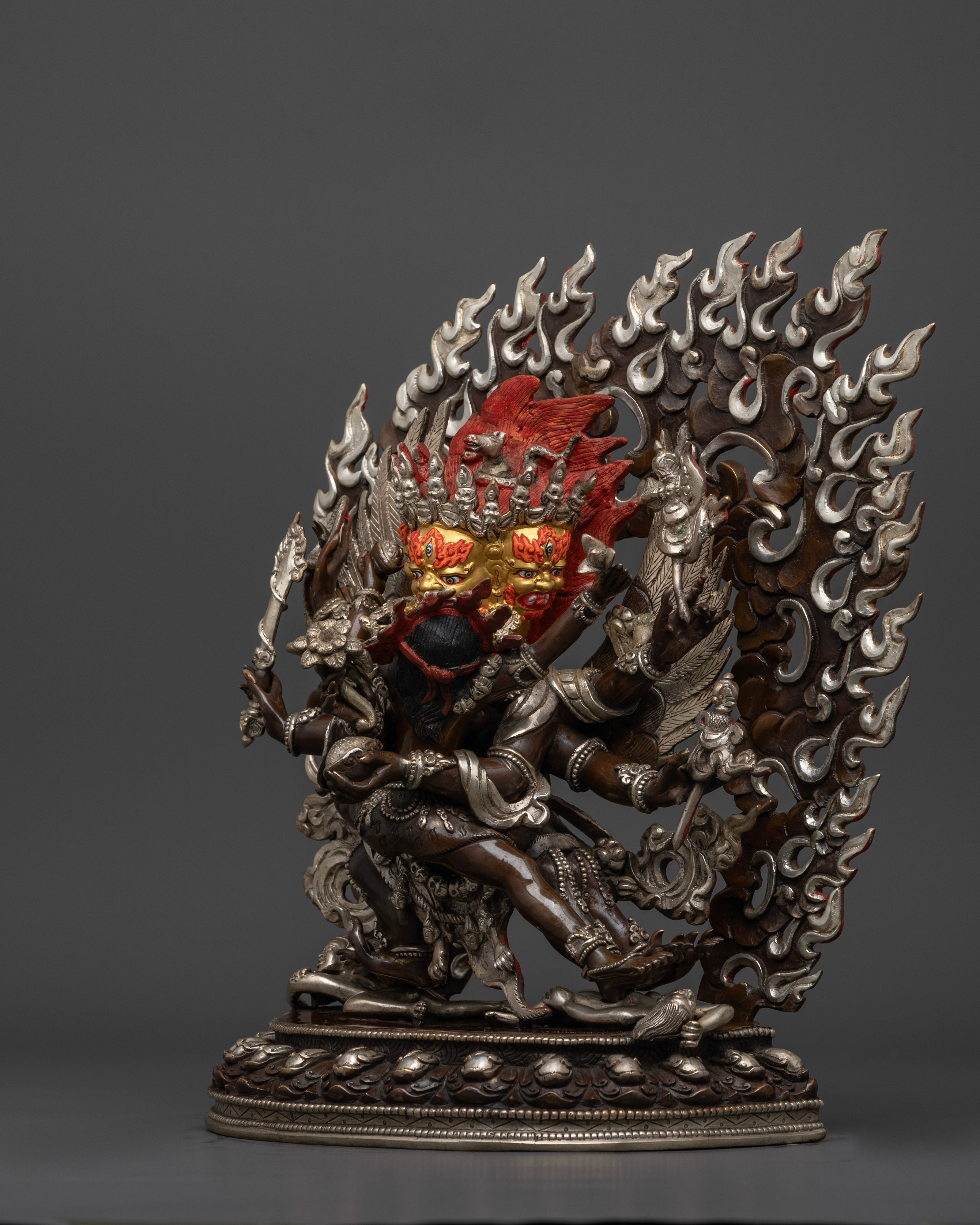 Hayagriva statue, focusing on the flowing design elements, oxidized copper background, and the rich silver plating that enhance the statue’s spiritual intensity and protective energy.
