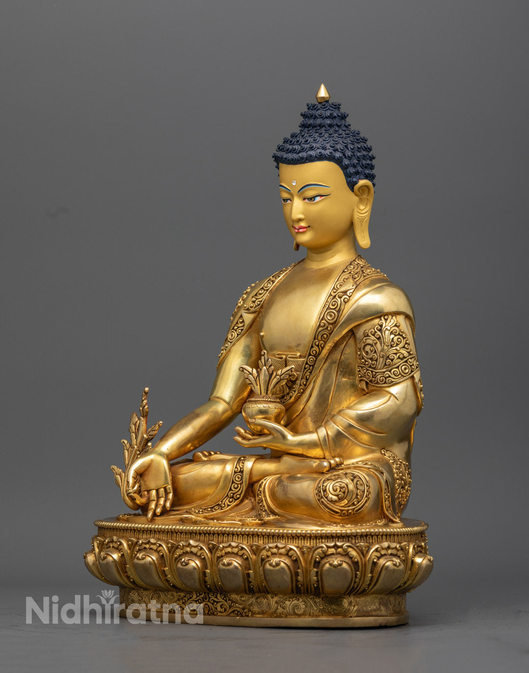 Premium gold-plated copper Medicine Buddha statue, seated in a tranquil pose, offering spiritual and physical healing through its craftsmanship.