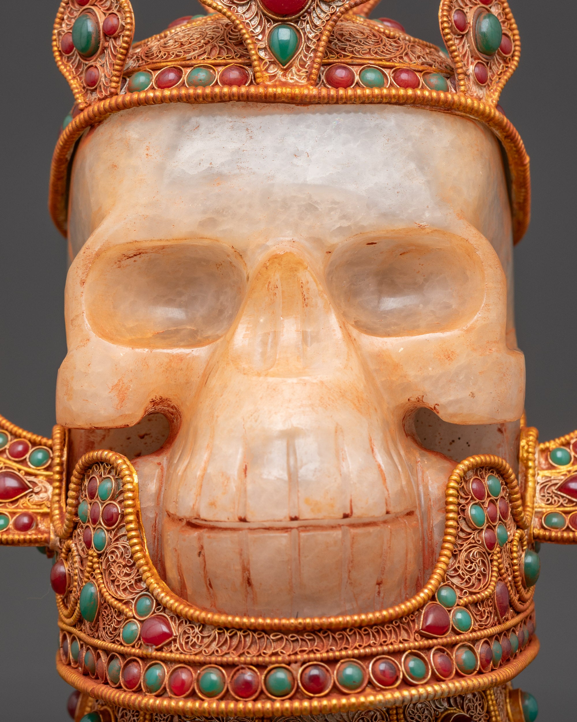 Himalayan Jeweled Skull Head side view with ornate crown and turquoise stones