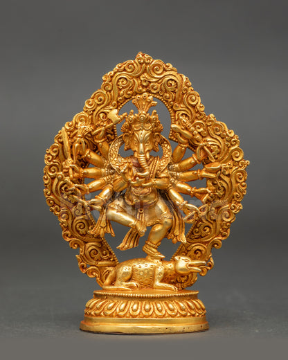 Hindu Ganesh statue with gold-painted and gold-gilded finish seated on lotus throne