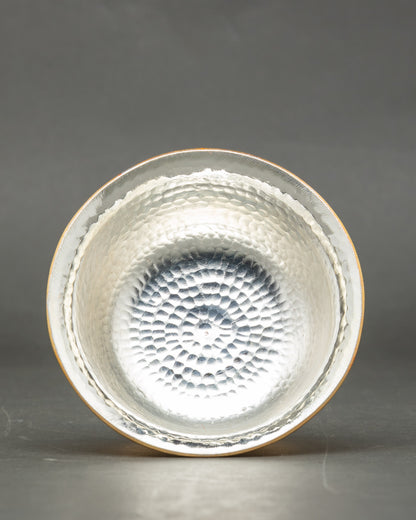 Inside view silver-plated water offering bowls showing smooth ritual interior