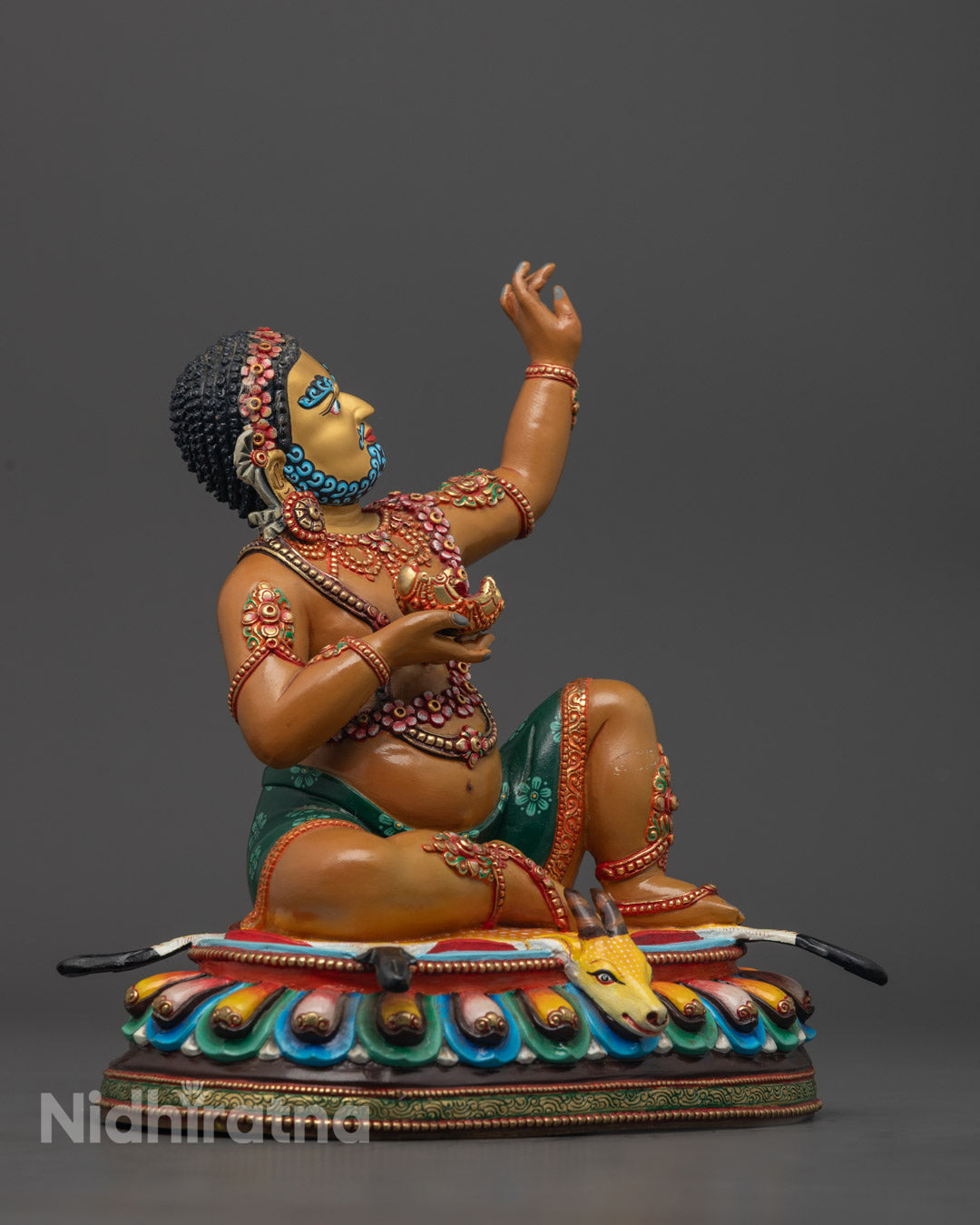 Intricate 24K gold-gilded Mahasiddha Virupa Statue, created using the traditional lost wax method in Patan, Nepal, with vivid acrylic colors emphasizing the sun-holding gesture and skull cup, a timeless Tibetan Buddhist treasure for altars and home decor.