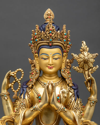 Intricate Avalokiteshvara statue detail showing carved floral robes and semi-precious stones