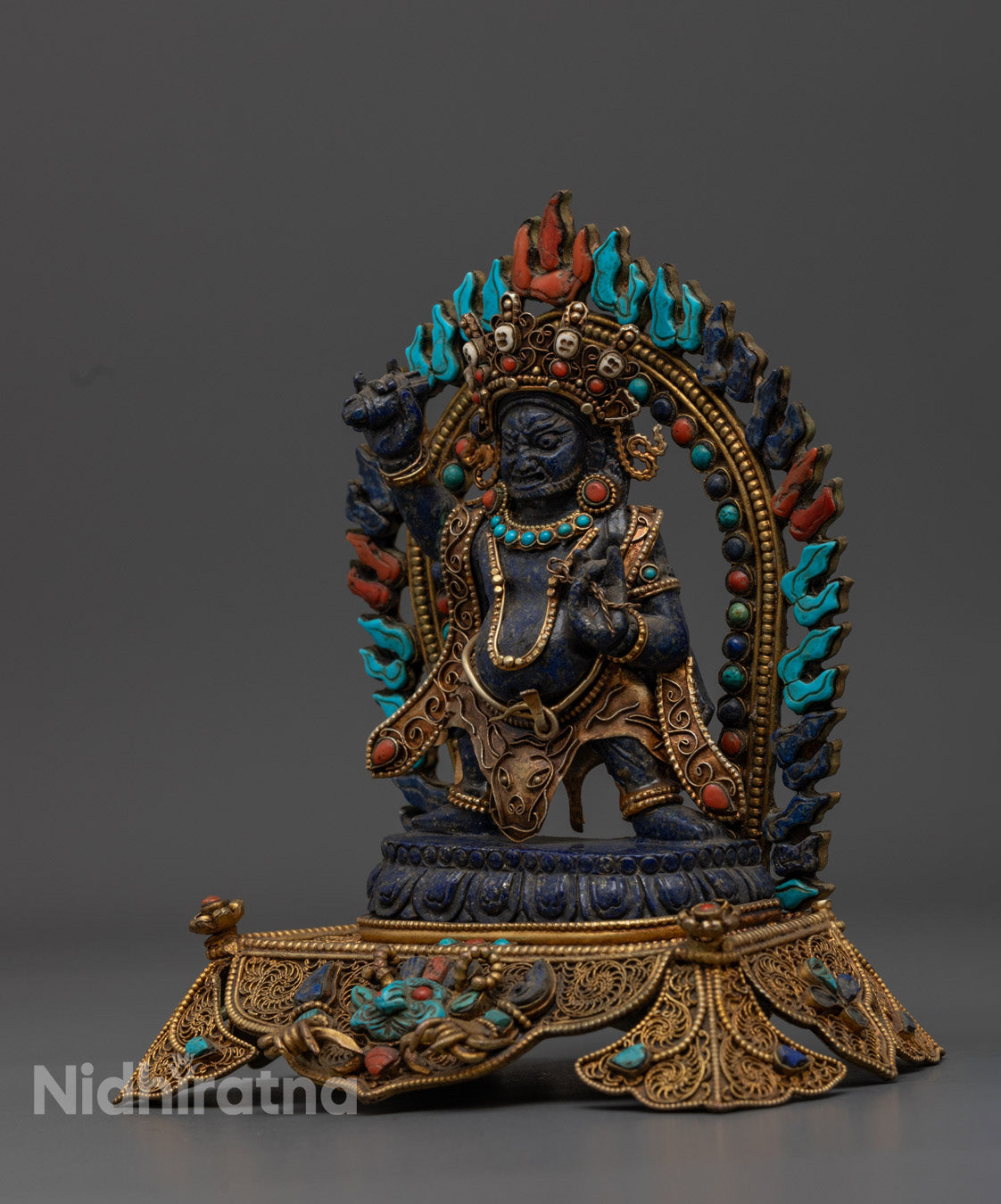 Intricate halo, crown, and throne of Vajrapani Mahasattva statue showcasing skilled craftsmanship and spiritual symbolism

