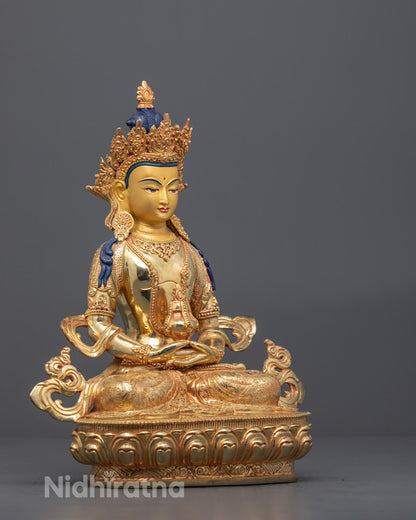 Intricately carved Amitayus sculpture featuring a swirling scarf and five-jeweled crown with rich acrylic color details