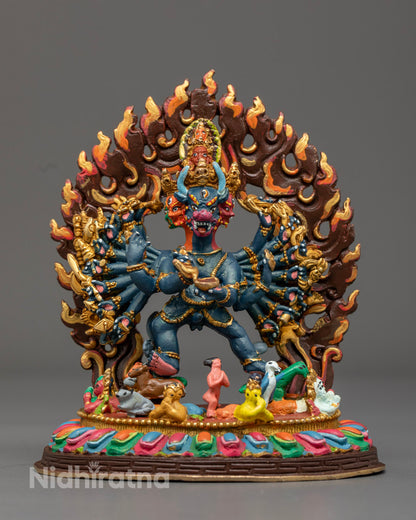 Intricately detailed Yamantaka Statue in copper with vibrant acrylic colors, showcasing wrathful deity features and hollow chamber for mantra placement.