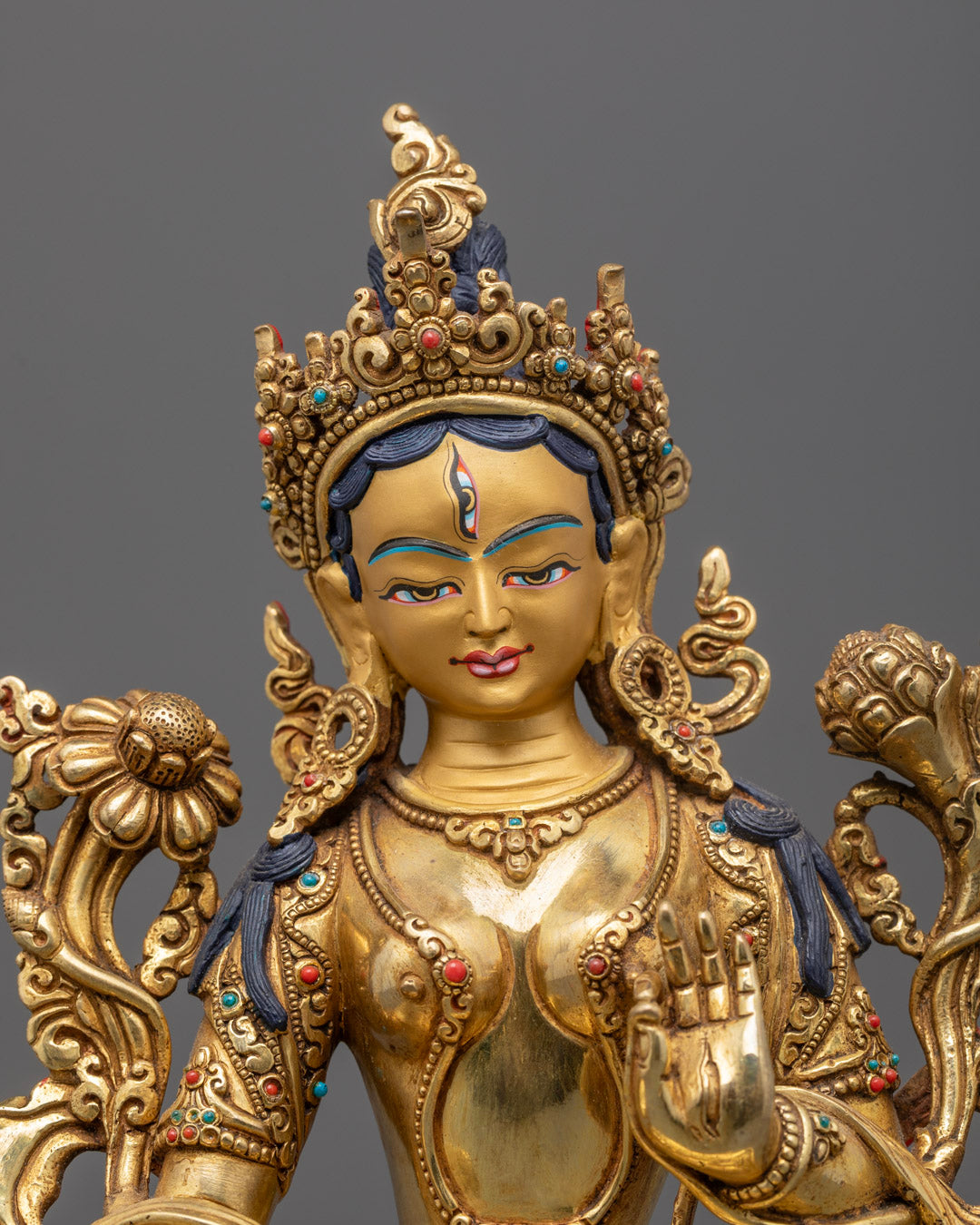 Intricately hand-carved 1000-Armed Chenrezig standing statue adorned with 24k fire-gilded gold, detailed lotus throne base, and hollow chamber for sacred mantra consecration, made in Nepal.