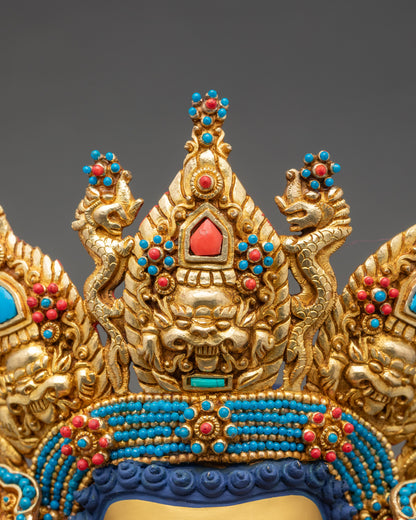 Five-pronged garuda crown detail on Jowo Shakyamuni Rinpoche statue symbolizing wisdom