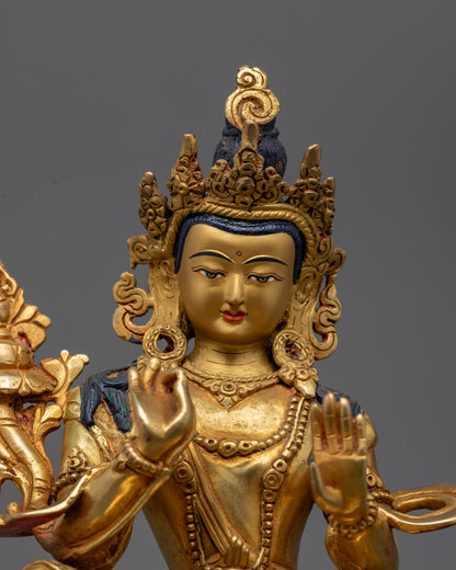 Kṣitigarbha holding an utpala flower, showcasing hand-painted acrylic details and sacred symbolism