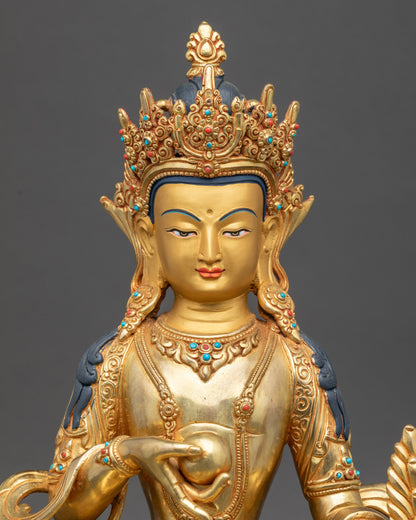 Kshitigarbha face, gold-painted expression with turquoise and coral stone details