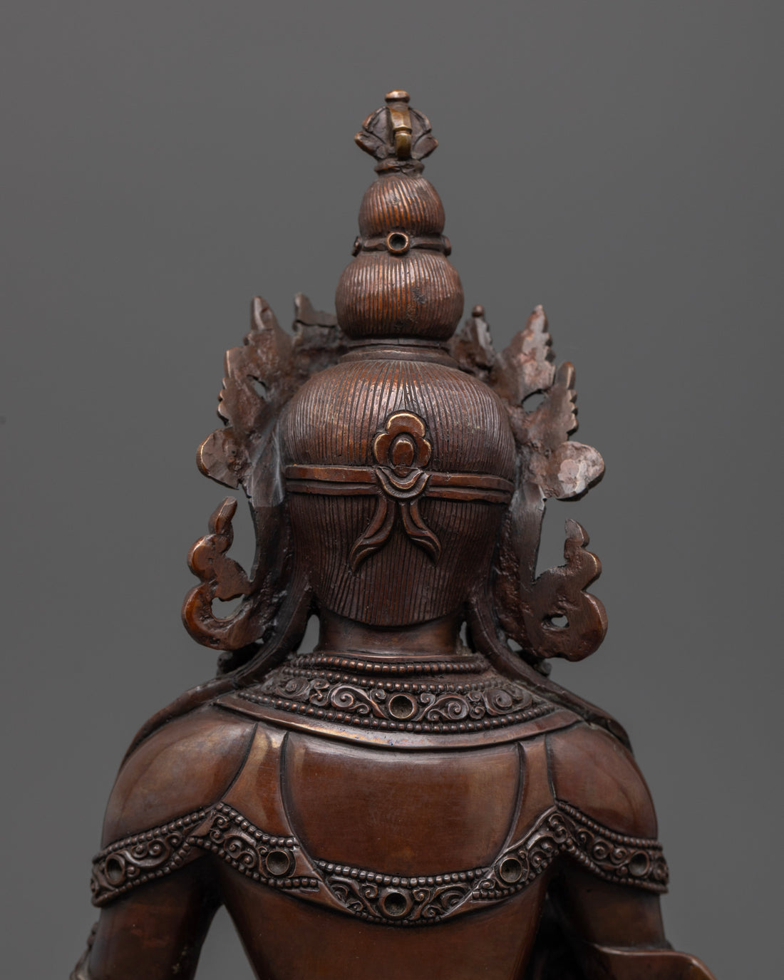 hair and crown seen from back of Kshitigarbha statue