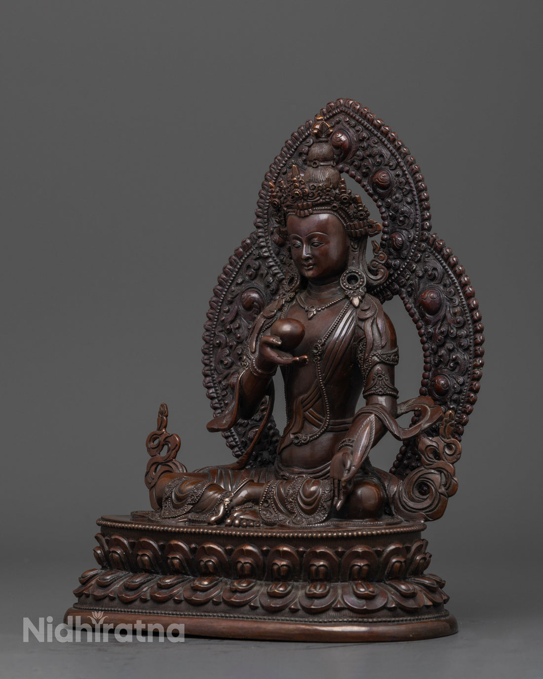 side view of Kshitigarbha oxidized copper statue