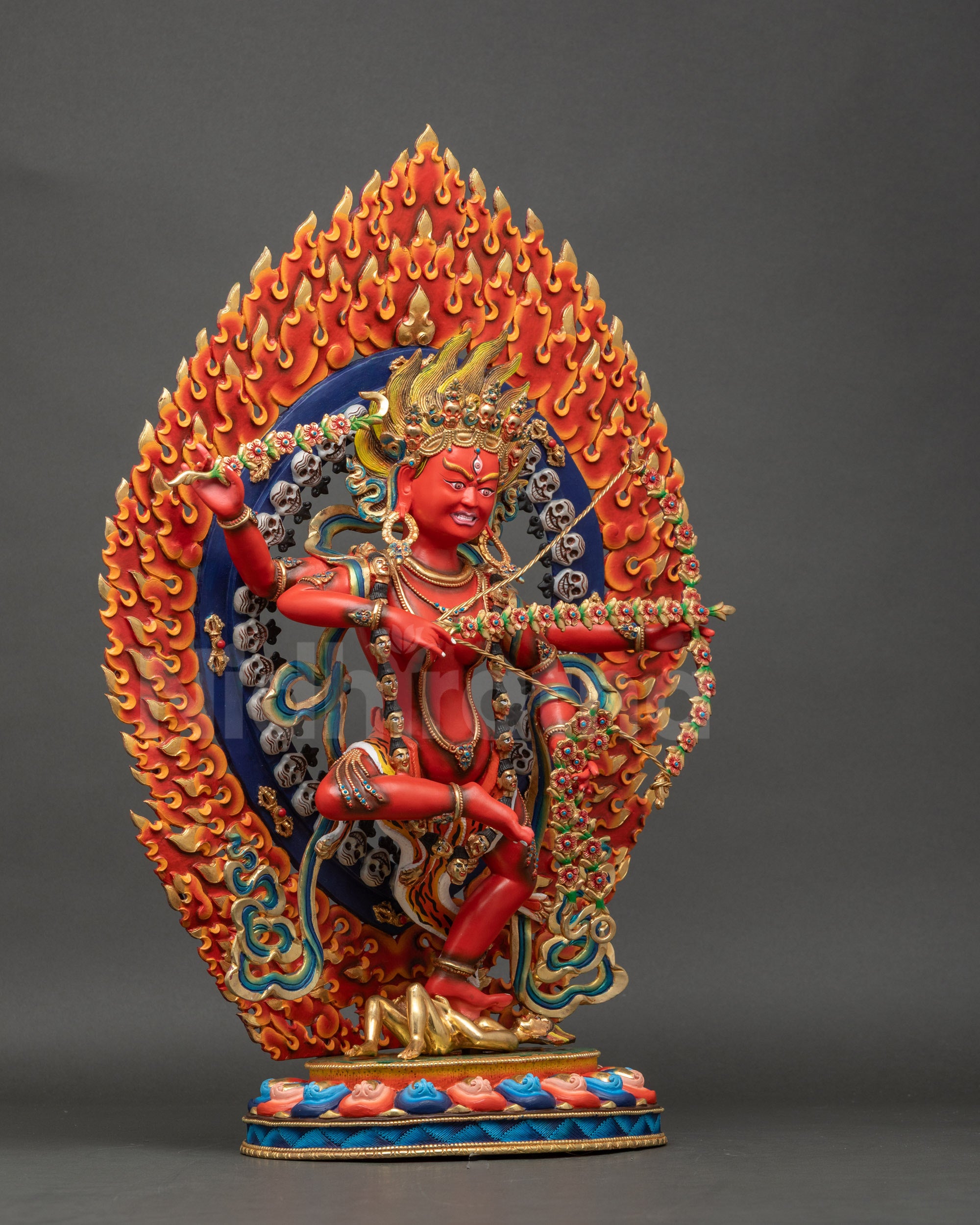 Kurukulla Statue right side view holding hook, noose, and bow with flower arrows