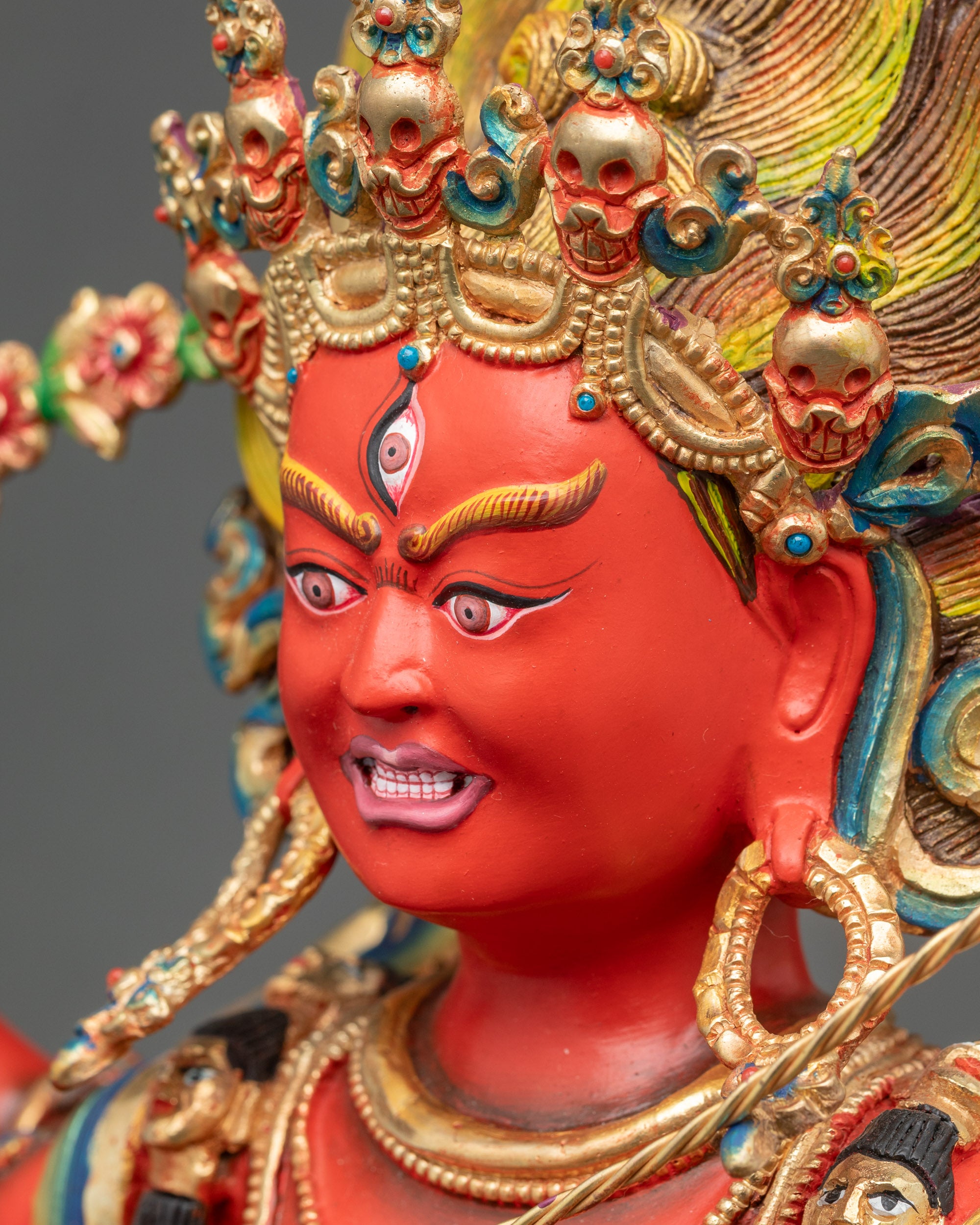 Kurukulla Statue side face close-up with fierce expression and dynamic posture