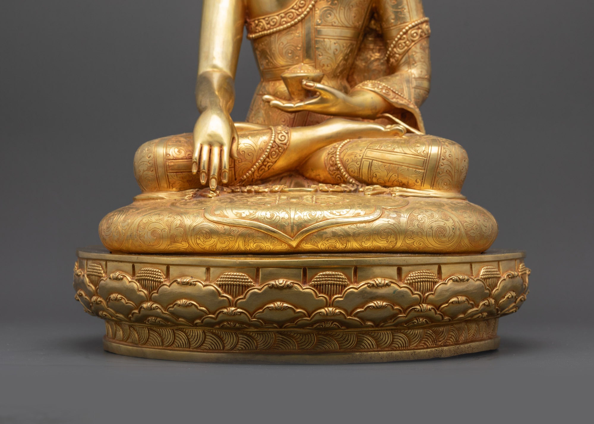 Landscape front shot of Buddha statue seated on lotus seat for altar display
