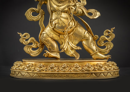 Landscape front view of Vajrapani statue seated on lotus seat
