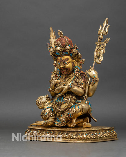 Left profile of Four-Armed Mahakala Statue, Newari craftsmanship with turquoise and coral