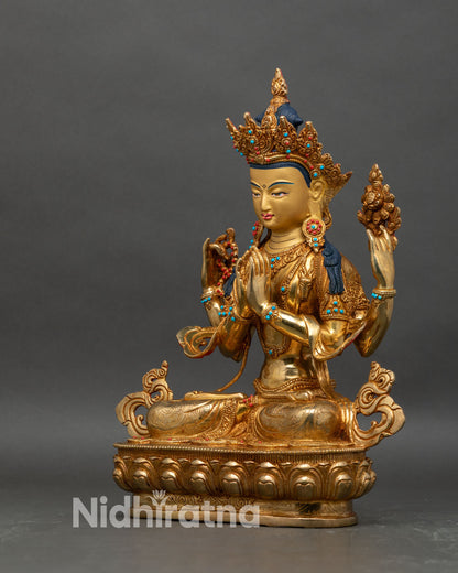 Left profile of Four-Armed Avalokiteshvara, lotus flower raised, copper and gold detailing