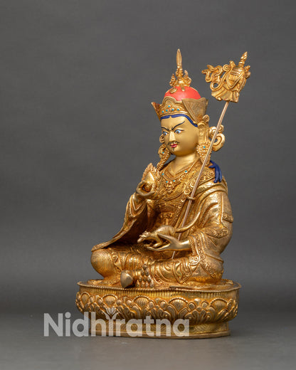 Left profile of Guru Norlha Tibetan wealth deity statue with lotus throne