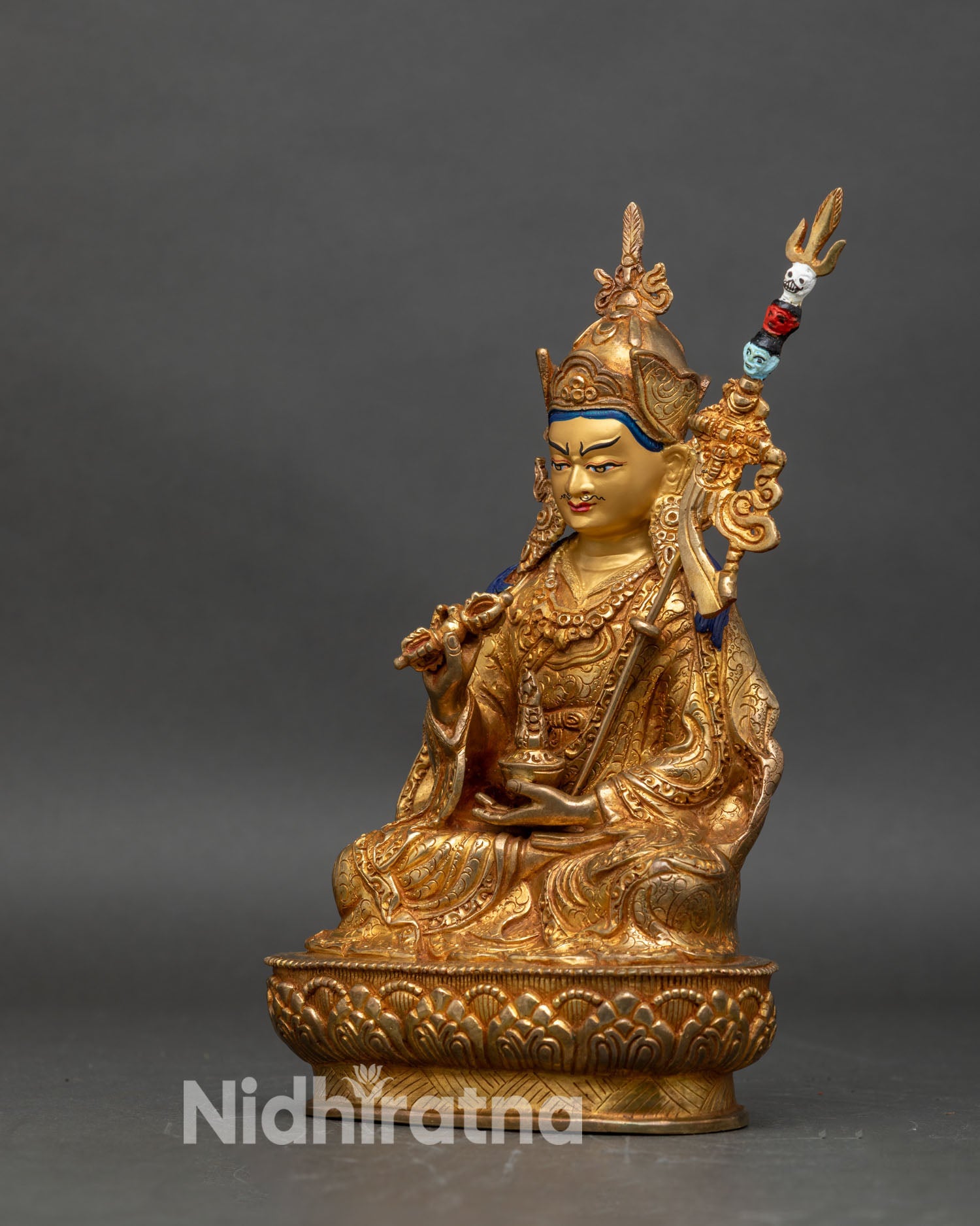 Left profile of Tsokye Dorje statue, fire-gilded copper Buddhist altar sculpture