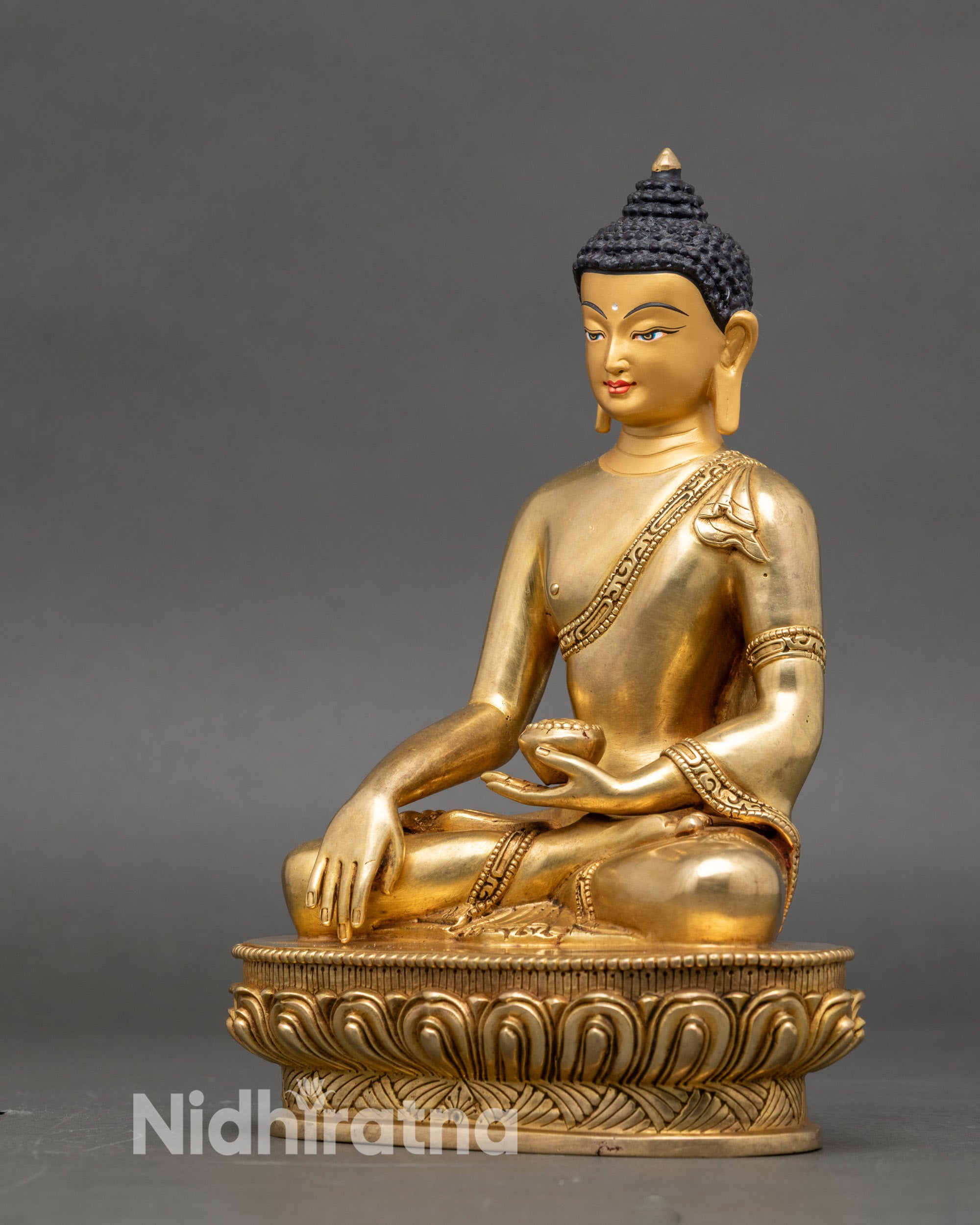 Left-side view of Shakyamuni Buddha statue, handcrafted copper with gold detailing