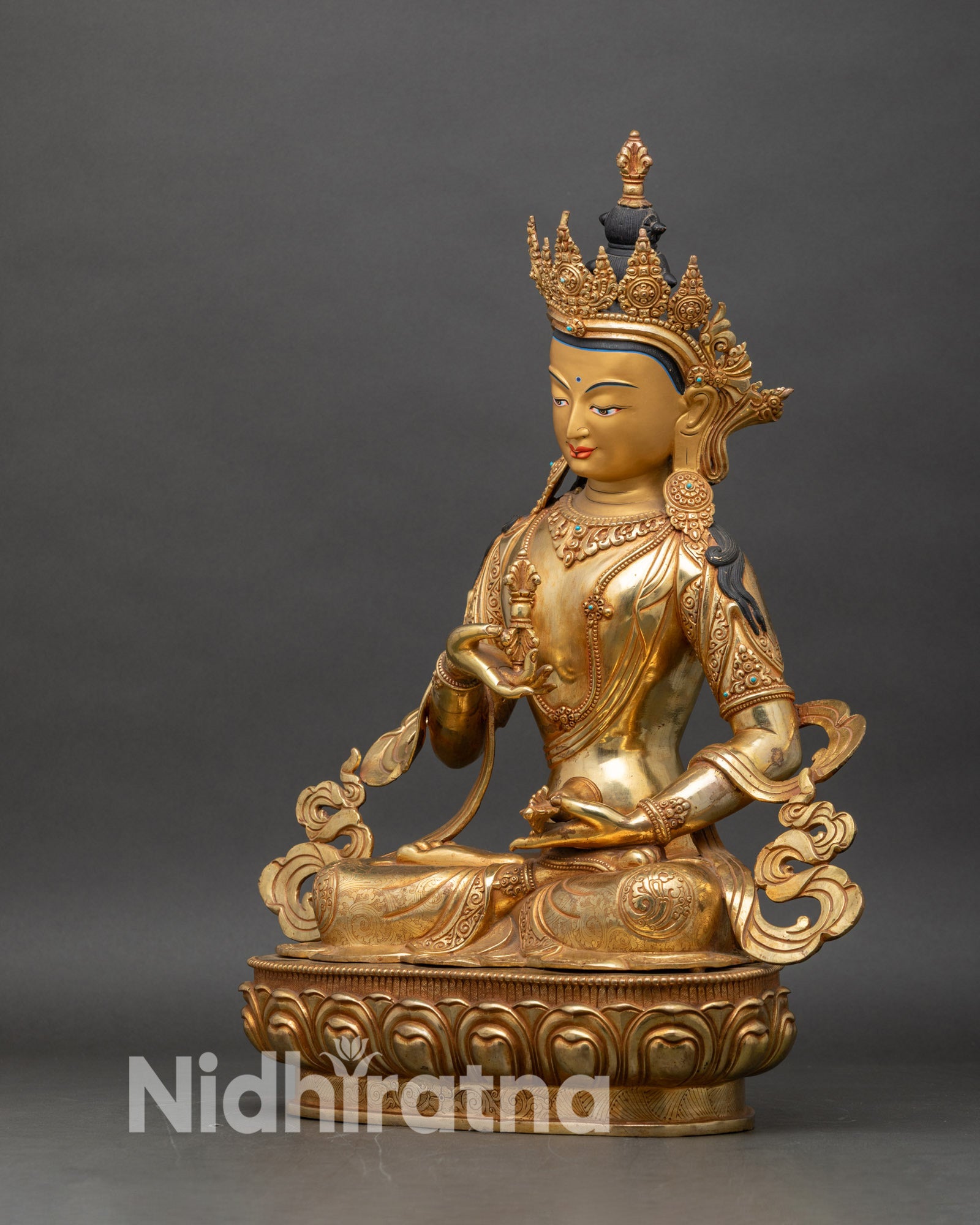 Left side view of Vajrasattva Buddha statue handcrafted copper and gold gilded artwork